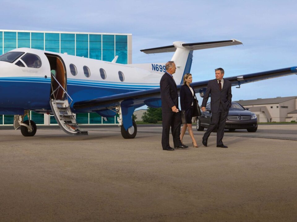 business people standing near aircraft lifestyle